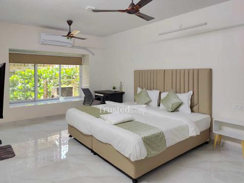 Bedroom One of Madhukunj Building Service Apartment in Andheri East, Mumbai